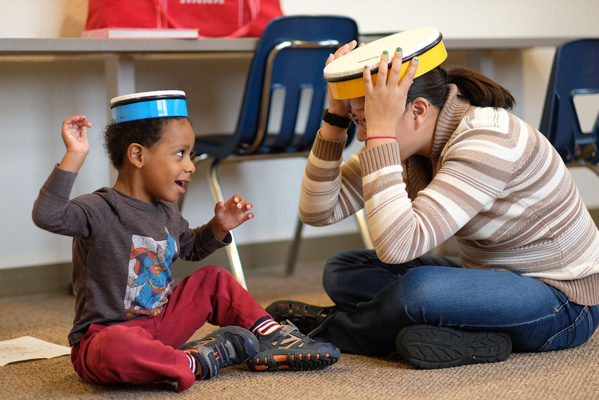 Therapist working with child