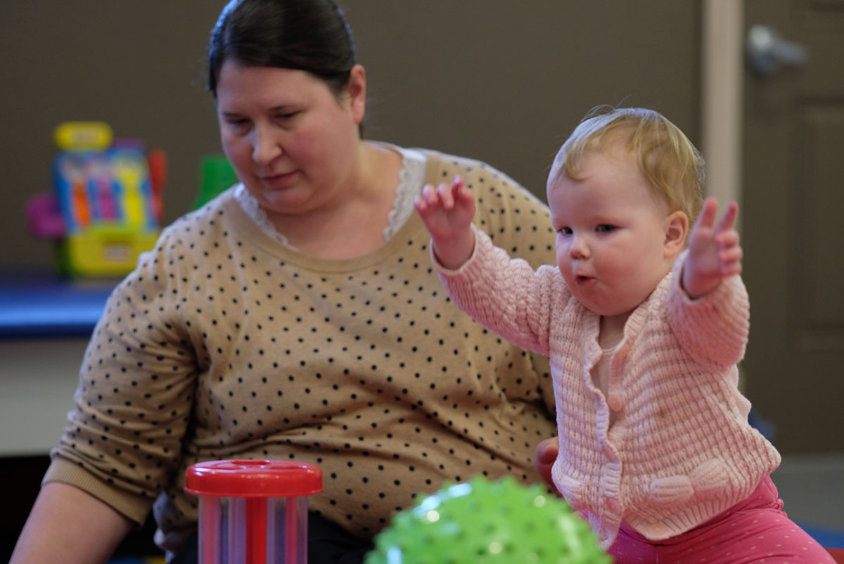 Therapist working with child