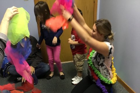 Therapist playing with children