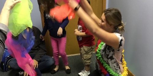 Therapist playing with children